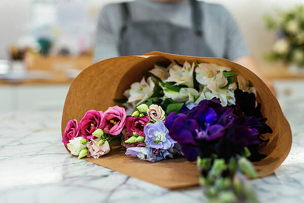 Wall Art - Photograph - Colorful Flower Bouquet On A Table In A Flower Shop by Cavan Images