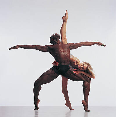 Female Dancer Standing On One Leg Print by Chris Nash
