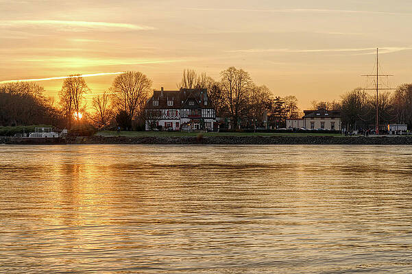 Golden sunset at rhine river by Uwe Gruen Golden sunset at rhine river by Uwe Gruen