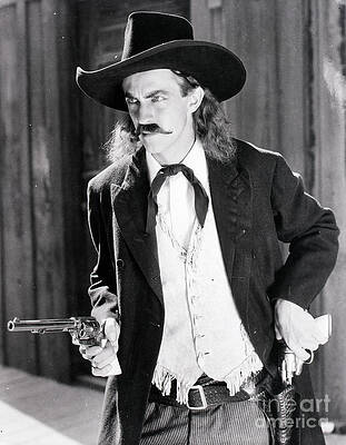 Gun Wielding Cowboy Of The Old West Print by Bettmann