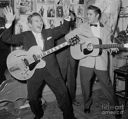 Wall Art - Photograph - Liberace And Elvis Presley Jamming by Bettmann