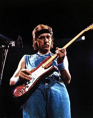 Wall Art - Photograph - Mark Knopfler Playing Guitar In Concert by Globe Photos