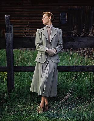 Wall Art - Photograph - Model Leaning On Rustic Fence In Tall Grass by Frances McLaughlin-Gill
