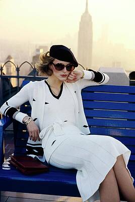 Wall Art - Photograph - Model On A Bench In Front Of The Empire State by Chris von Wangenheim