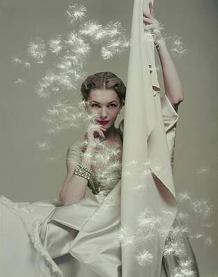 Wall Art - Photograph - Model With Silk And Floating Dandelion Seeds by Herbert Matter