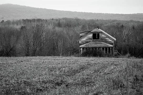 Old abandoned house falling apart in the country by Michael Tatman