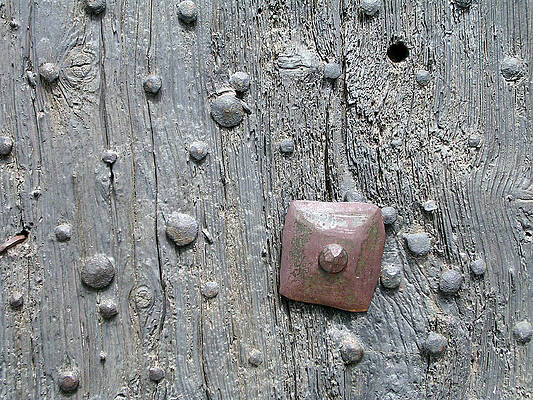 Wall Art - Photograph - Old Nails In A Door by Olikim