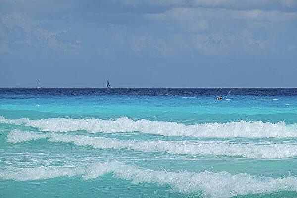 Sailing and Jet Skiing on the beautiful blue water of Cancun Beach Cancun Mexico by Toby McGuire Sailing and Jet Skiing on the beautiful blue water of Cancun Beach Cancun Mexico by Toby McGuire