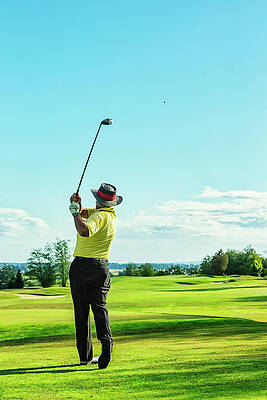 Senior Golfer On Golf Course Teeing Off Print by Jhorrocks