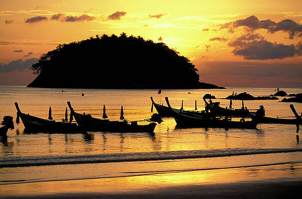 Sunset At Phuket Beach With Silhouettes Print by Laughingmango