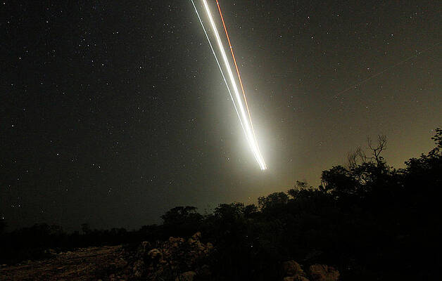 Wall Art - Photograph - The Lights of an Approaching Plane by Gerardo Garcia