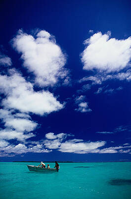 Tourists In Boat On Aitutaki Print by Dallas Stribley