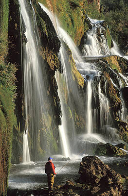 Wall Art - Photograph - Usa, Idaho, Mature Man Fishing For by Steve Bly