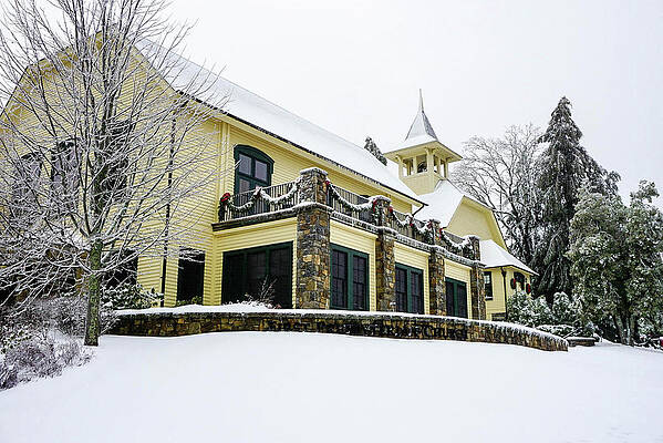 Yellow Building decorated for Christmas in the snow by Seth Solesbee Yellow Building decorated for Christmas in the snow by Seth Solesbee