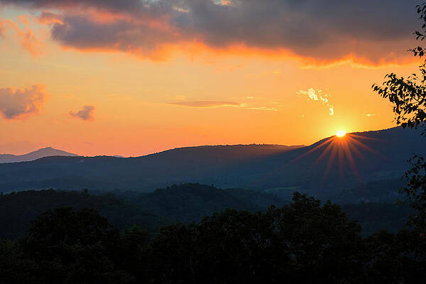 Wall Art - Photograph - Sun Dips Below the Horizon #1 by Charles Floyd