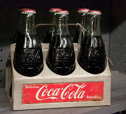 1950s coca cola bottles in a tray by Christopher Flees 1950s coca cola bottles in a tray by Christopher Flees