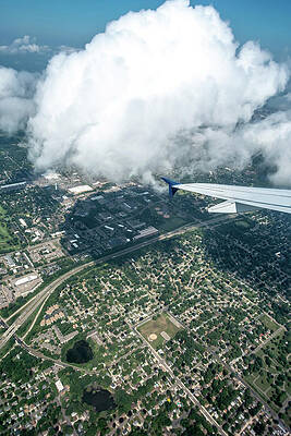 above the clouds and above minneapolis minnesota from airplane by ALEX GRICHENKO above the clouds and above minneapolis minnesota from airplane by ALEX GRICHENKO