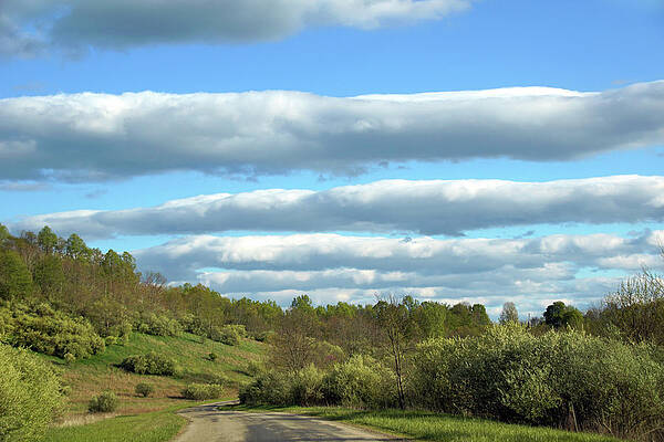 Wall Art - Photograph - A Line of Clouds by Mike Murdock