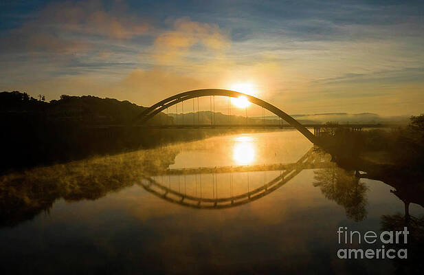 Aerial view as Steam fog rise from Lake Austin on the 360 Pennybacker Bridge by Herronstock Prints Aerial view as Steam fog rise from Lake Austin on the 360 Pennybacker Bridge by Herronstock Prints