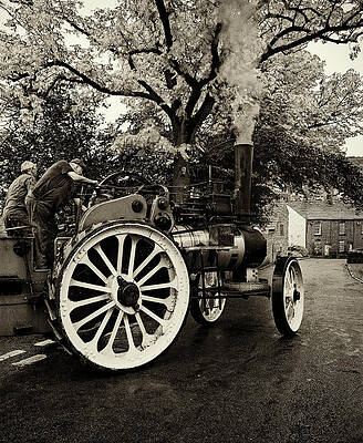 An early 20th Century traction engine steaming through the tiny village of Chinley, in Derbyshire, E by Panoramic Images An early 20th Century traction engine steaming through the tiny village of Chinley, in Derbyshire, E by Panoramic Images