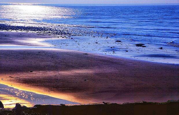 Beach at low tide by Chris Clark Beach at low tide by Chris Clark