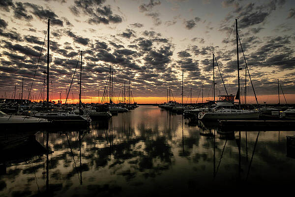 Beautiful sky reflected in harbor waters by Sven Brogren Beautiful sky reflected in harbor waters by Sven Brogren