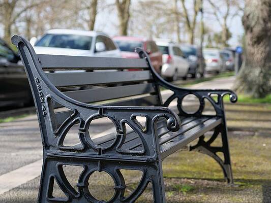 Bench for people to sit along the Thames river embankment in Windsor, Berkshire, England, UK by Santosh Puthran Bench for people to sit along the Thames river embankment in Windsor, Berkshire, England, UK by Santosh Puthran