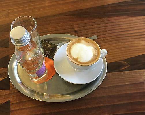 Wall Art - Photograph - Cappuccino and bottled water break on Bled Island, Solvenia by Mike Worley