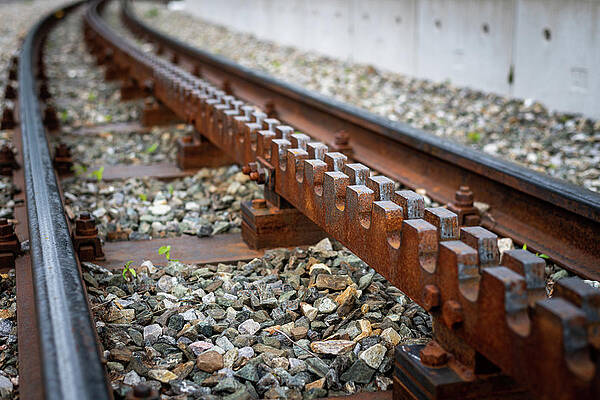  Photograph - Closeup of rusty train tracks of rack railway by Stefan Rotter