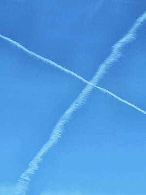 Wall Art - Photograph - Contrails in Blue sky by Roberta Byram