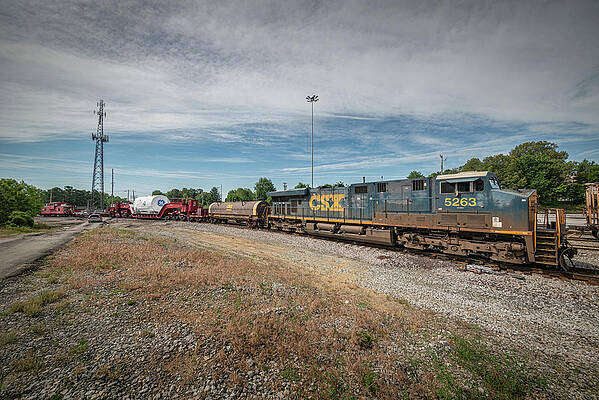CSX W993-31 At Atkinson Yard Madisonville Ky With A Oversized GE Load by Jim Pearson CSX W993-31 At Atkinson Yard Madisonville Ky With A Oversized GE Load by Jim Pearson