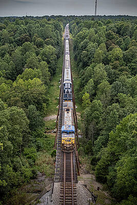 CSX X60504 heads north across the Gum Lick Trestle Crofton KY by Jim Pearson CSX X60504 heads north across the Gum Lick Trestle Crofton KY by Jim Pearson