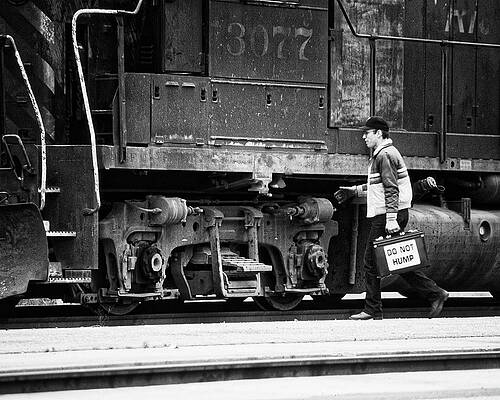 Do Not Hump -- Train Engineer and EMD GP40 Locomotive in San Luis Obispo, California by Darin Volpe Do Not Hump -- Train Engineer and EMD GP40 Locomotive in San Luis Obispo, California by Darin Volpe