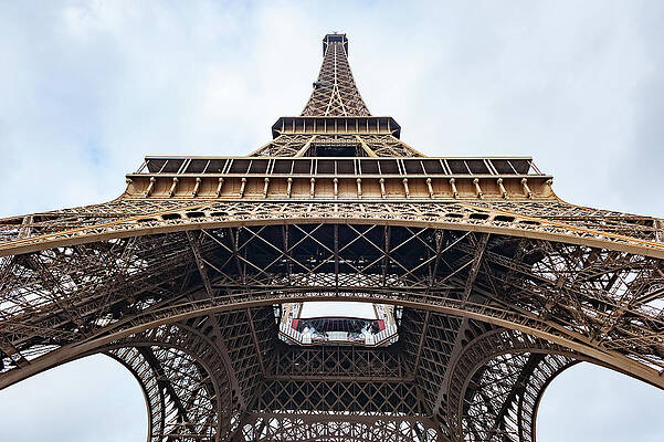 Eiffel tower low wide angle view in Paris by Philippe Lejeanvre Eiffel tower low wide angle view in Paris by Philippe Lejeanvre