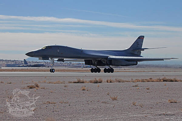 Wall Art - Photograph - Ellsworth based B-1B Lancer 86-0111 launching from 03R Nellis AFB by Custom Aviation Art