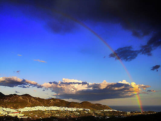 Evening rainbow over Frigiliana and Nerja, Malaga Province, Andalucia, Spain by Panoramic Images Evening rainbow over Frigiliana and Nerja, Malaga Province, Andalucia, Spain by Panoramic Images