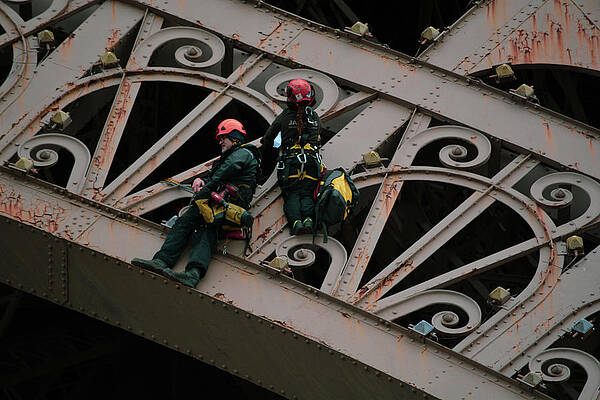 Fixing the Eiffel Tower Lights by Katy L