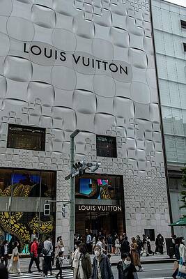People walk past Louis Vuitton store in rain at night in Tokyo Photograph  by Iain Masterton - Fine Art America