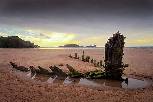 Helvetia shipwreck, Rhossili at sunset by Victoria Ashman Helvetia shipwreck, Rhossili at sunset by Victoria Ashman
