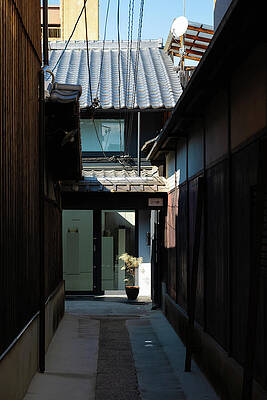 Kyoto - Hidden Alley with Potted Plant and Traditional Roof by Matthias Hauser Kyoto - Hidden Alley with Potted Plant and Traditional Roof by Matthias Hauser