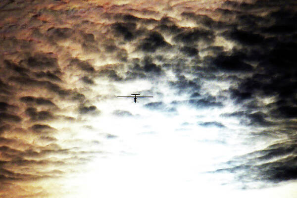 Light Aircraft Flies Into Apocalyptic Clouds by Ian Hutson Light Aircraft Flies Into Apocalyptic Clouds by Ian Hutson