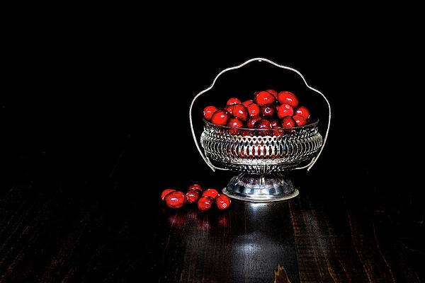 Low Key Cranberries in Silver Basket Bowl on Brown Base by Charles Floyd Low Key Cranberries in Silver Basket Bowl on Brown Base by Charles Floyd