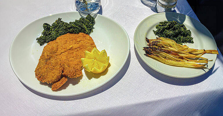 Wall Art - Photograph - Lunch entree of veal cutlet with lots of spinach and white asparagus at a restaurant on the edge of Lake Como in Bellagio, Italy. by Mike Worley