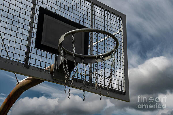 Metal Basketball Board And Ring With Chains In Front Of Sky With Heavy Clouds by Andreas Berthold Metal Basketball Board And Ring With Chains In Front Of Sky With Heavy Clouds by Andreas Berthold