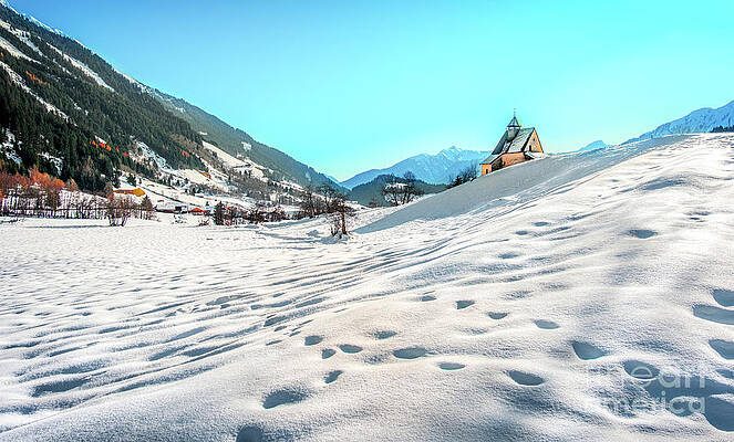 Mountain landscape, picturesque snow footprints in the winter morning panoramic church by Luca Lorenzelli Mountain landscape, picturesque snow footprints in the winter morning panoramic church by Luca Lorenzelli