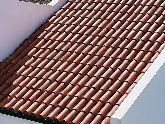 Ornament terracotta red tiles on roof in Tenerife, Canarian islands by Santosh Puthran Ornament terracotta red tiles on roof in Tenerife, Canarian islands by Santosh Puthran