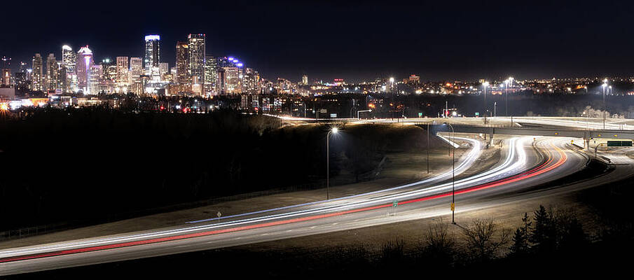 Panoramic night cityscape of Calgary with lightrails by Peter Kolejak Panoramic night cityscape of Calgary with lightrails by Peter Kolejak