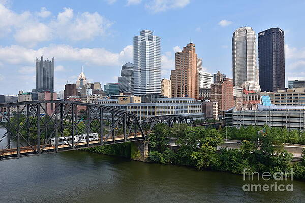 Pittsburgh and The Panhandle Bridge on a Blue Sky White Pillowy Cloud Day by Nick Garuccio Pittsburgh and The Panhandle Bridge on a Blue Sky White Pillowy Cloud Day by Nick Garuccio
