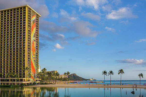 Wall Art - Photograph - Rainbow tower frames the shore in Waikiki Hawaii by Steven Heap