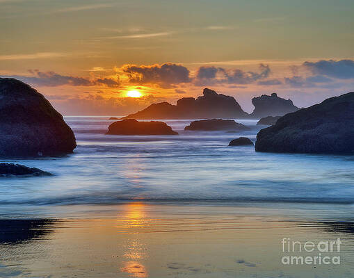 Sunset over sea stacks by Izet Kapetanovic Sunset over sea stacks by Izet Kapetanovic